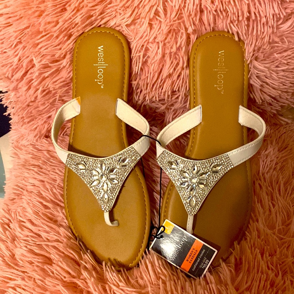 White rhinestones embedded flip flops. Size 10